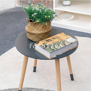 Table basse ronde en bois du milieu du siècle